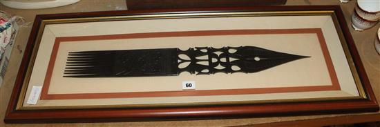 Framed Kenyan carved comb